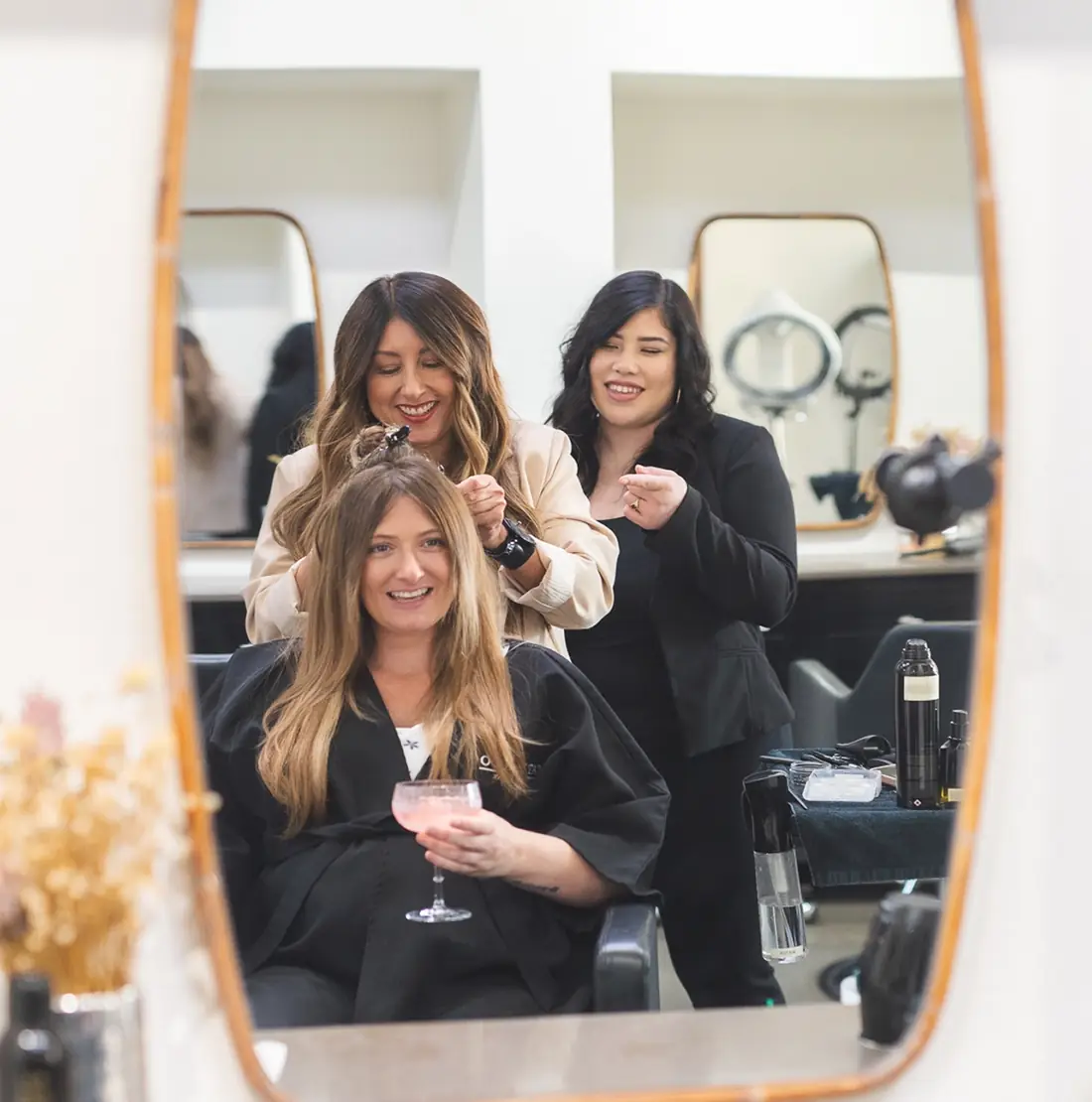 Booth rental stylist with client at Studio One